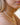 Combinatie van gouden ketting en een parel ketting